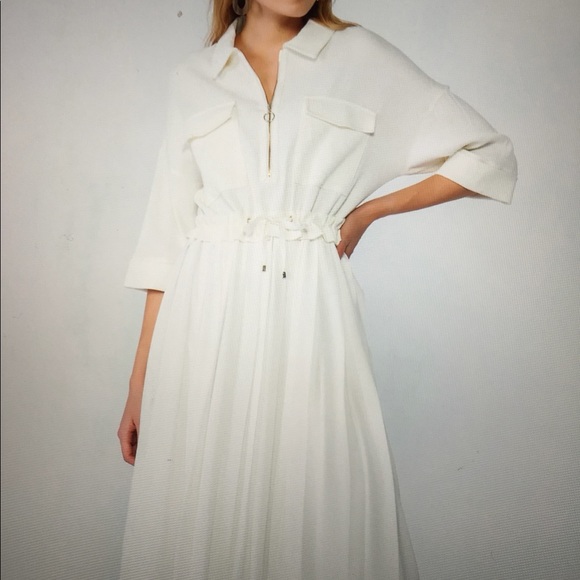 Pocket and zipper detailed midi dress. - Picture 11 of 11